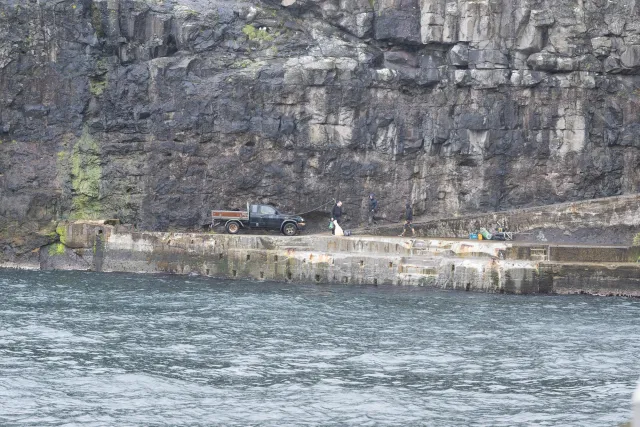 The sea and the steep cliffs between the islands of Vidoy, Fugloy and Svinoy