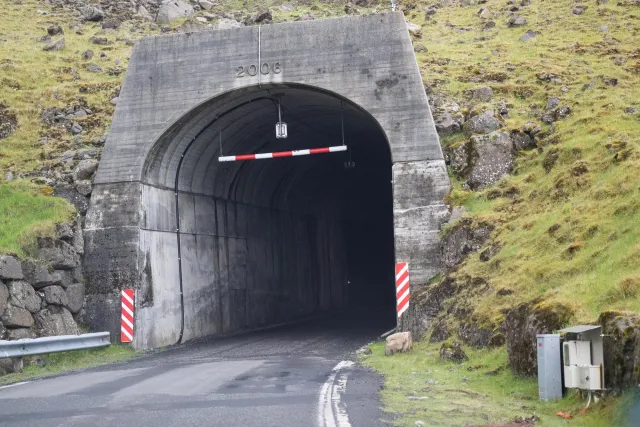 The narrow tunnel to the Mulafossur waterfall on Vágar